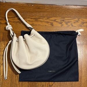 Behno Ina Pebble medium bone Leather Shoulder Bag.
New. Never used.
